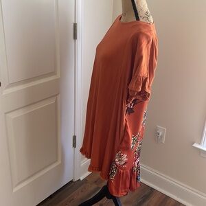 Beautiful Anthropologie Umgee brand loose fit rust colored dress, size S/M